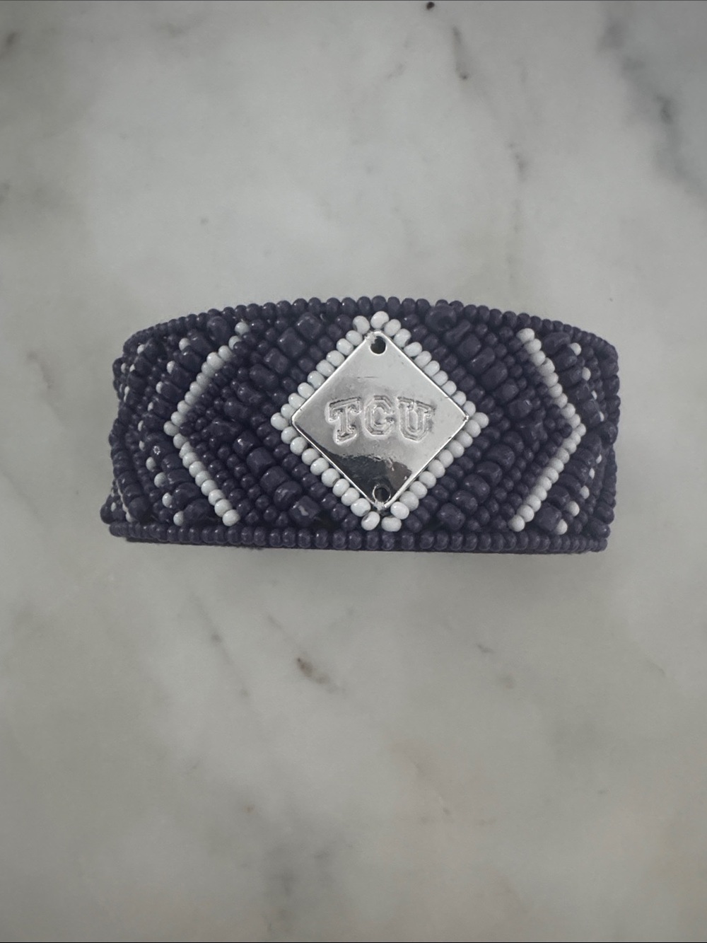 TCU Beaded Bracelet in Dark Purple and White with Silver Emblem